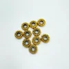 Set de 10 cuentas cilindro oro Bisutería